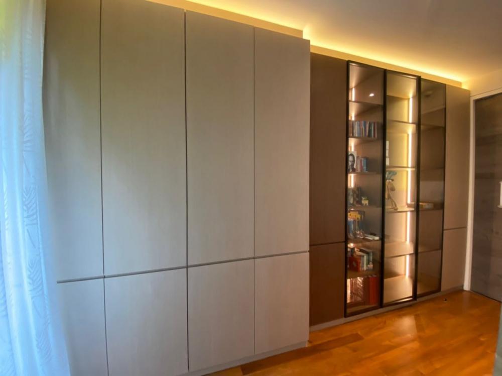 Contemporary Bedroom with Parquet Floor and Cove Lighting