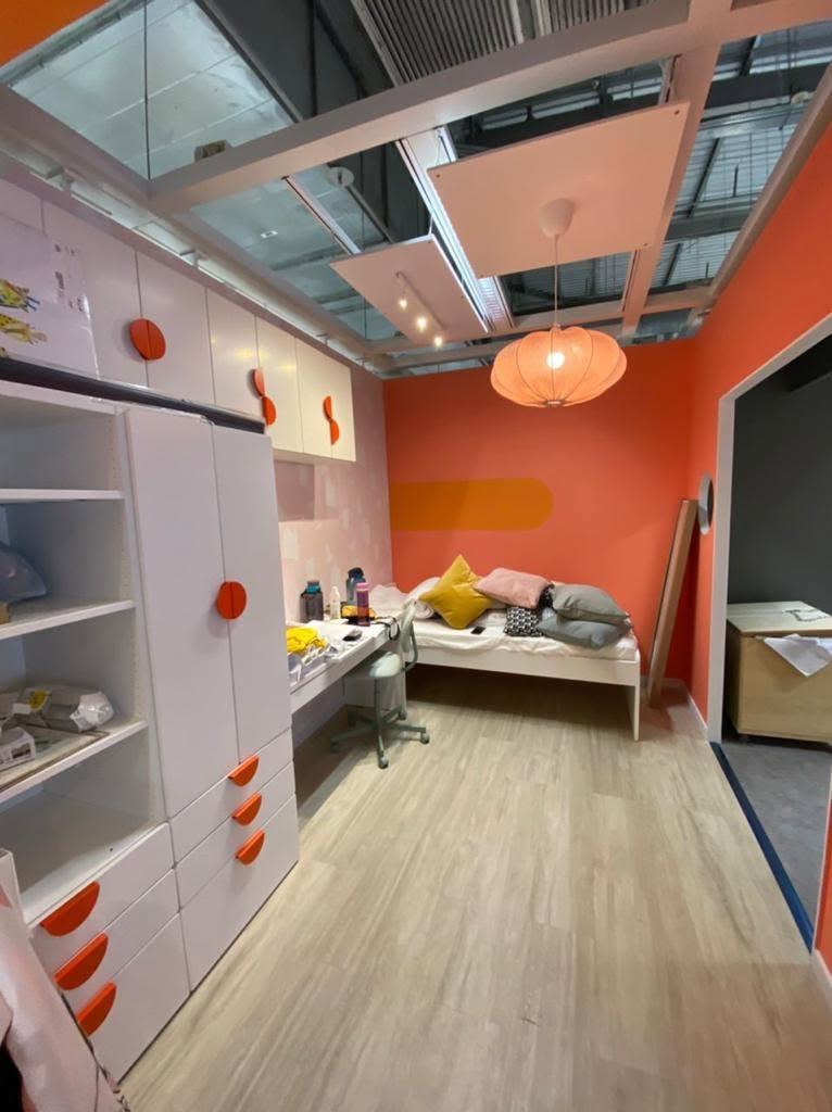 Modern Bedroom with Bookshelf and Vinyl Flooring