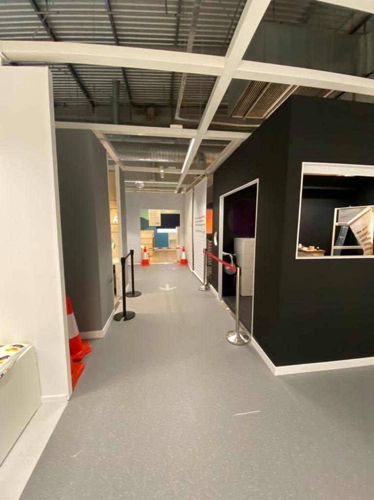 Modern Hallway with Artwork and Paintings