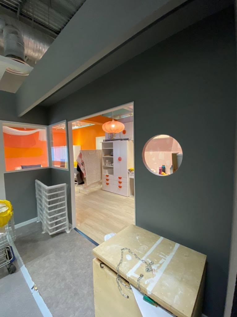 Modern Bedroom with Vinyl Flooring and Cement Floor