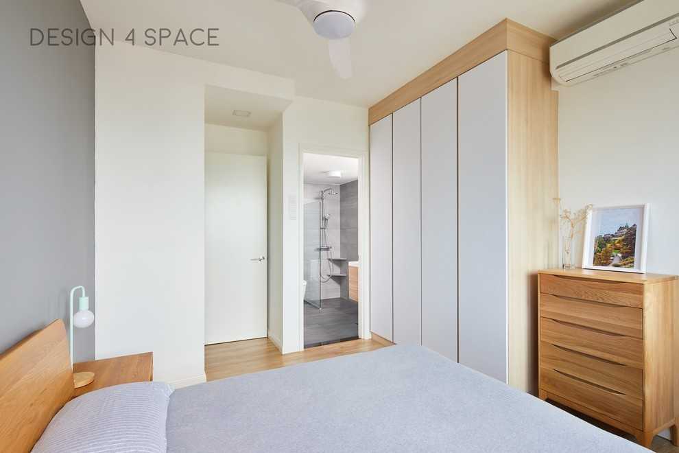 Minimalist Bedroom with Drop Light and Queen Bed