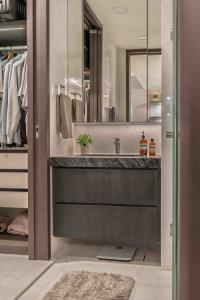 Modern Bathroom at Marina One Residence