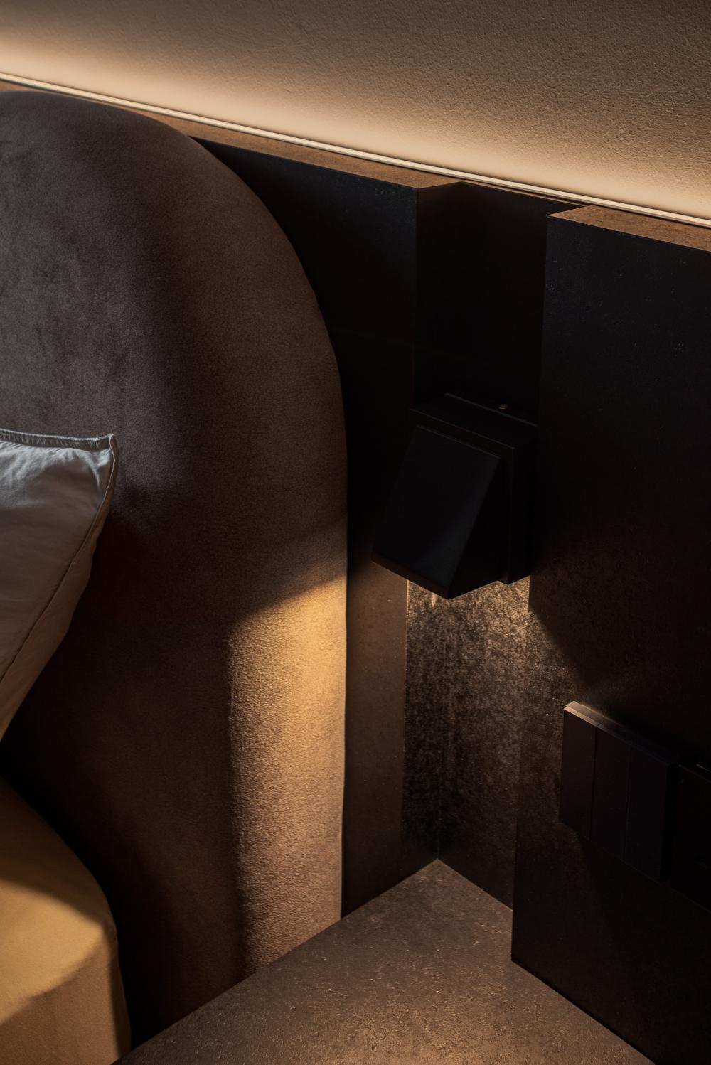Modern Bedroom with Cove Lighting and Built-in Bed
