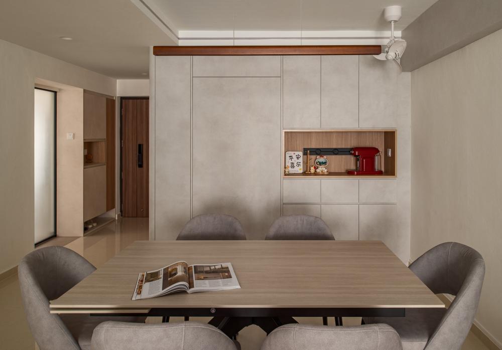 Contemporary Dining Room with Feature Wall and Drop Light