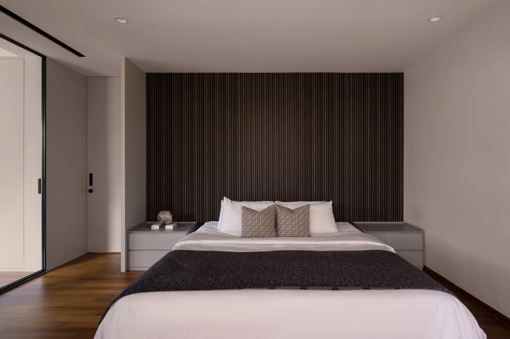 Contemporary Bedroom with Wood Flooring and Closet