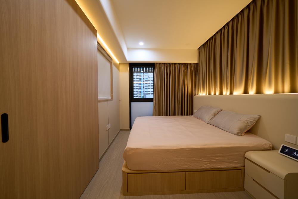 Modern Bedroom with Ceiling Light and Bedside Table
