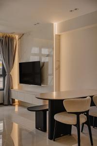 Modern Living Room at Garden Bloom @ Tengah