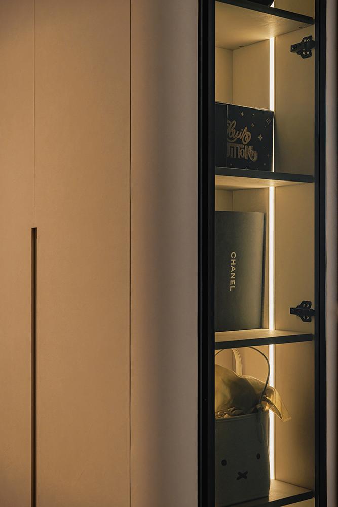 Modern Bedroom with Display Cabinets and Lighting