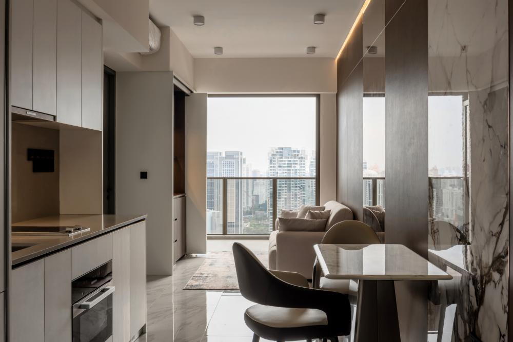 Modern Foyer with Dining Table and Kitchen Cabinets
