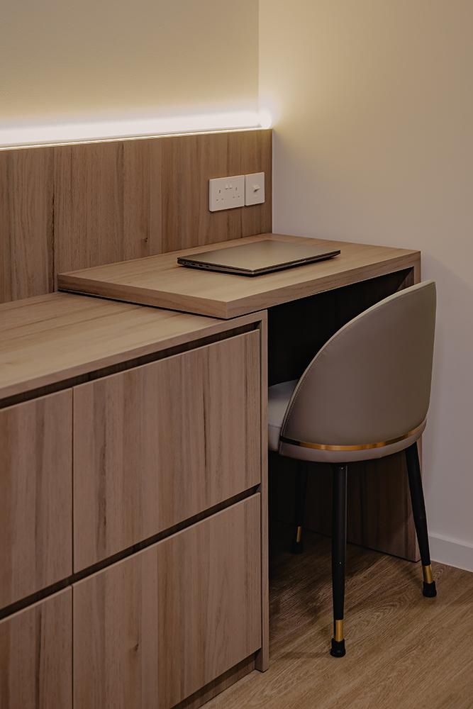 Minimalist Bedroom with Vinyl Flooring and Feature Wall