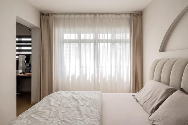 Asian Bedroom with Curtain and Bed