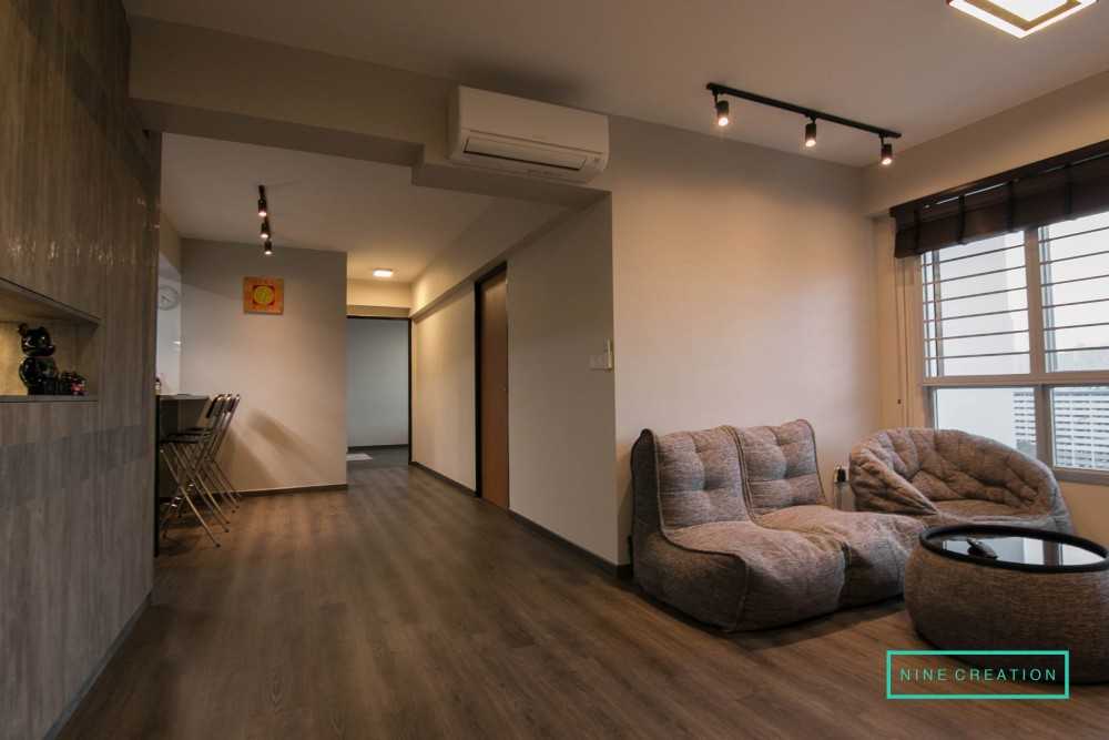 Contemporary Living Room with Parquet Floor and Drop Light
