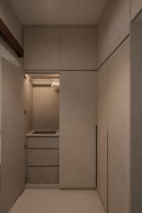 Minimalist Walk-in Wardrobe at 462C Yishun