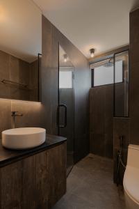 Industrial Bathroom at Costa Rhu II
