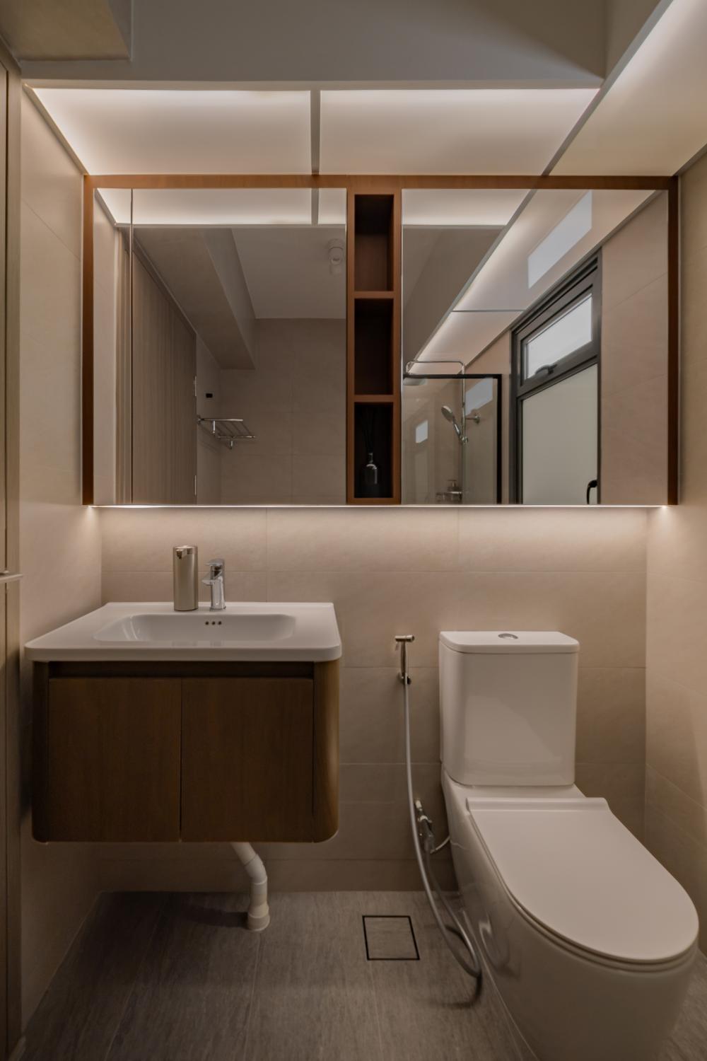 Minimalist Bathroom with Homogeneous Tiles and Mirror