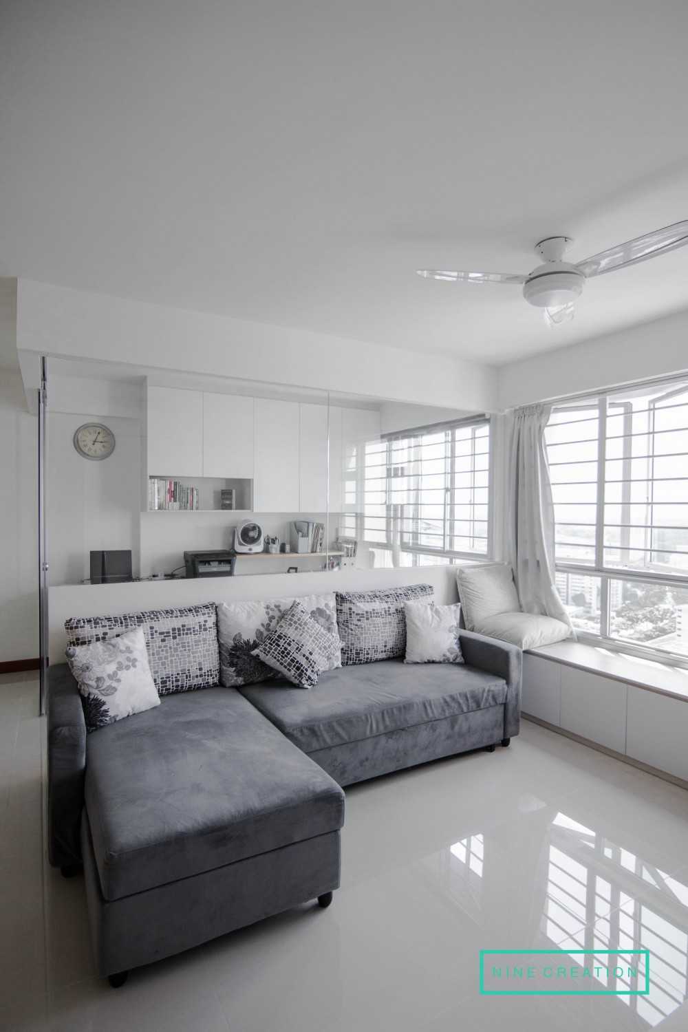 Modern Living Room with Bookshelf and Settee