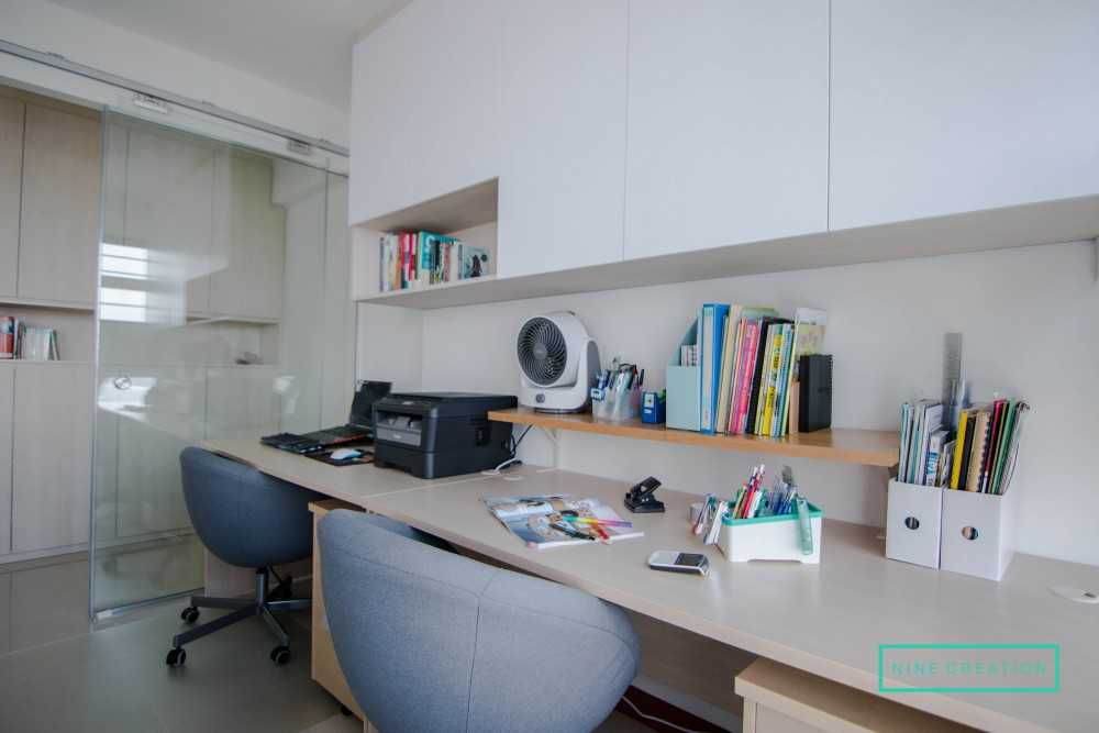 Modern Bedroom with Bookshelf and Homogeneous Tiles