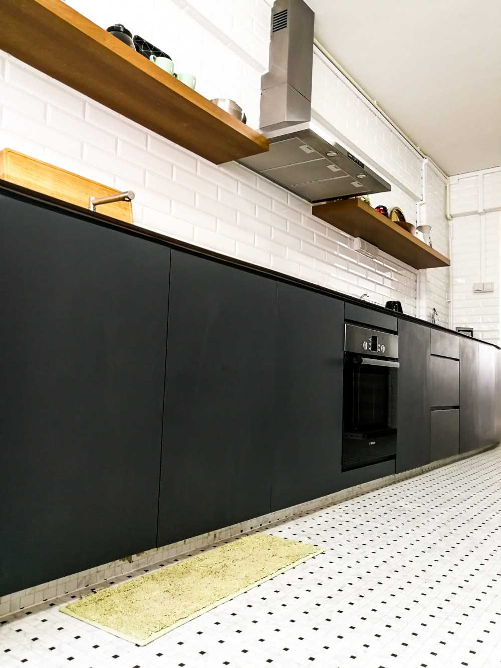 Scandinavian Kitchen with Homogeneous Tiles and Feature Wall