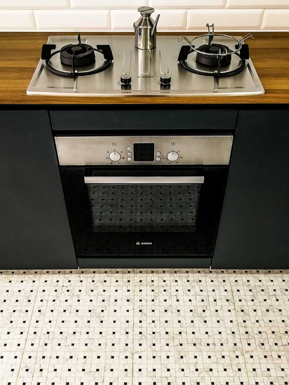 Scandinavian Kitchen with Countertop and Homogeneous Tiles