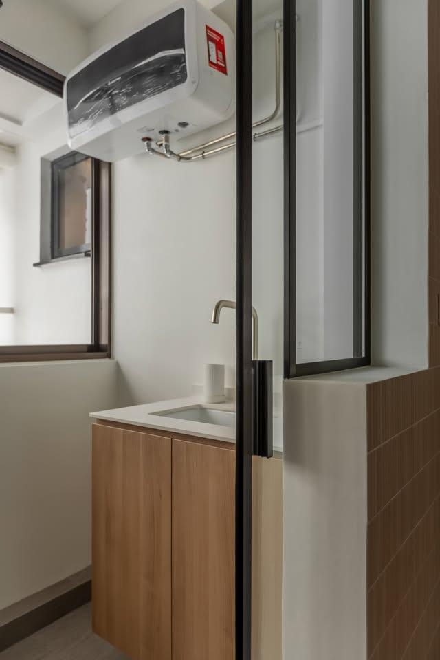 Modern Service Yard with Washing Machine and Ironing Board