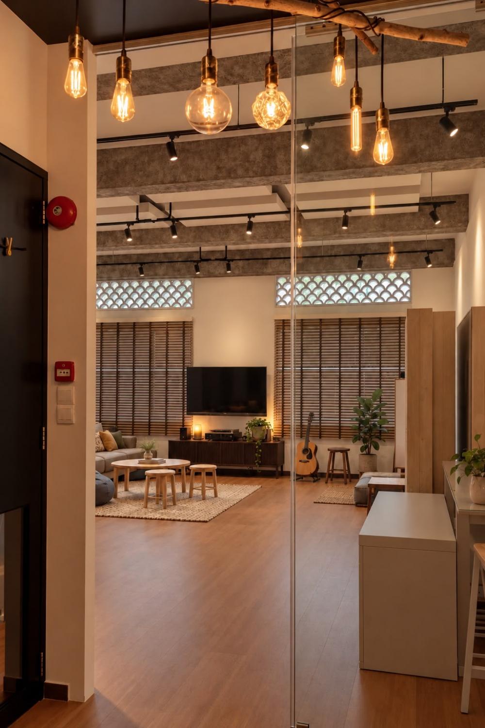 Eclectic Studio with TV Console and Sofa