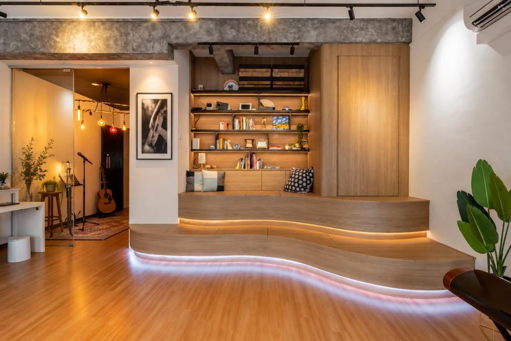 Eclectic Studio with Bookshelf and Cove Lighting