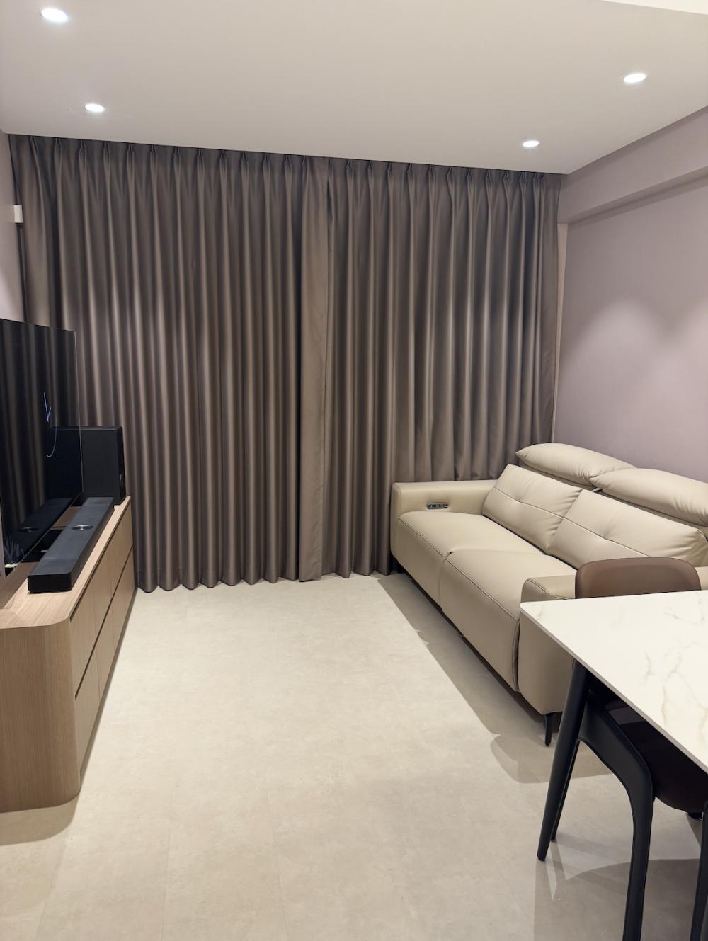 Modern Living Room with Homogeneous Tiles and TV Console