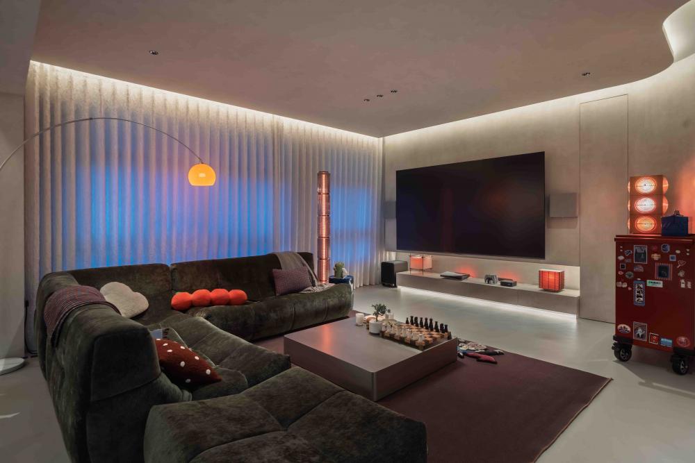 Industrial Living Room with TV Console and Cove Lighting