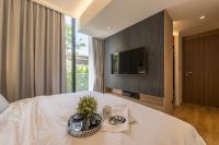 Contemporary New Condominium by erstudio Pte Ltd