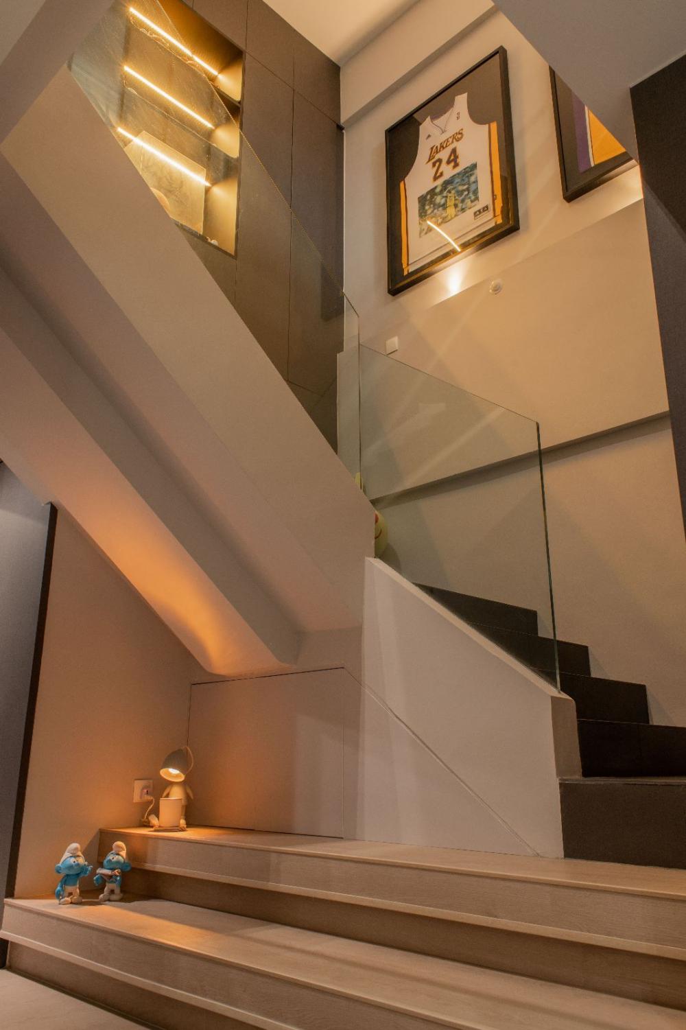 Scandinavian Hallway with Staircase and Artwork