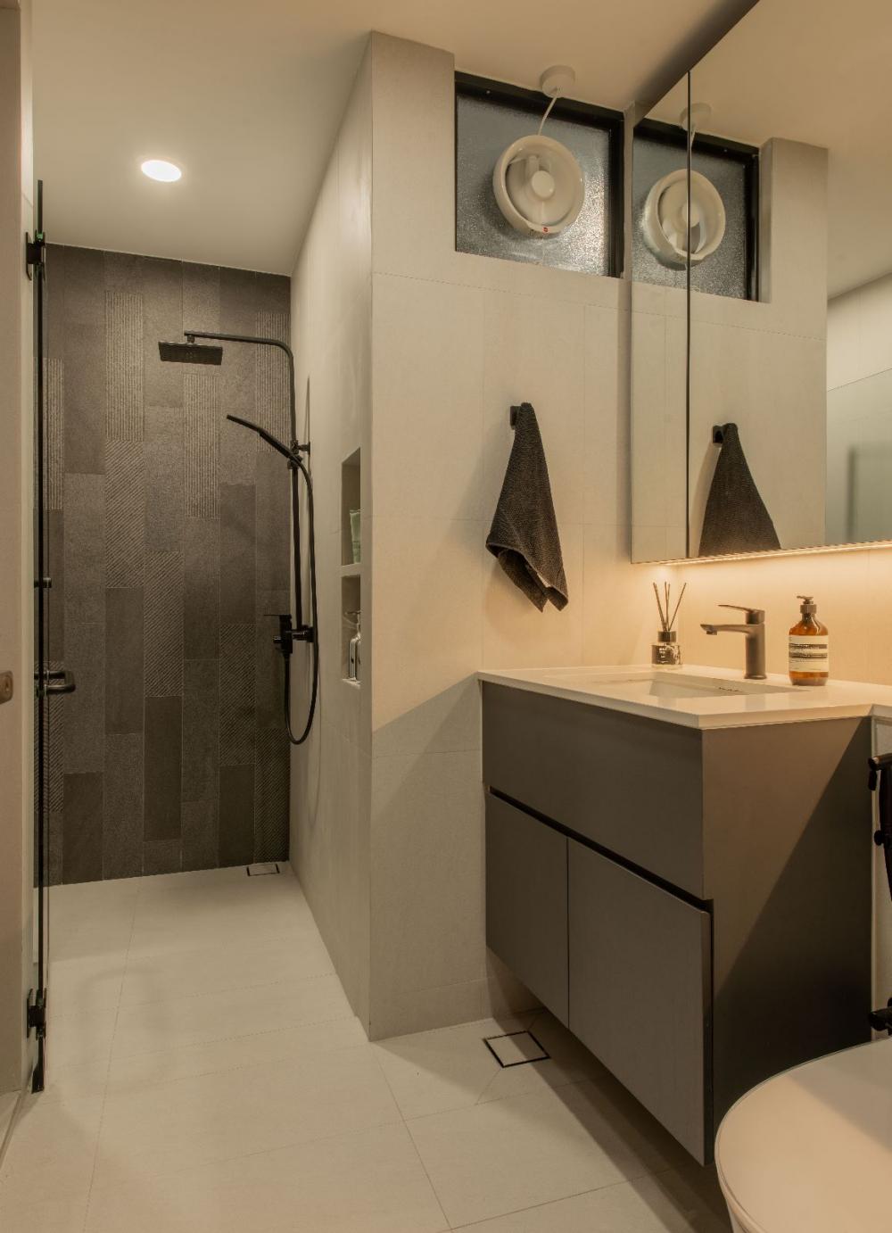 Scandinavian Bathroom with Rainshower and Laundry Baskets