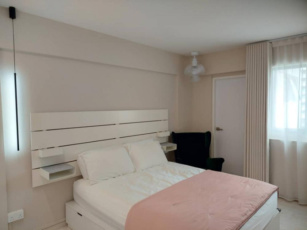 Minimalist Bedroom with Feature Wall and Sofa