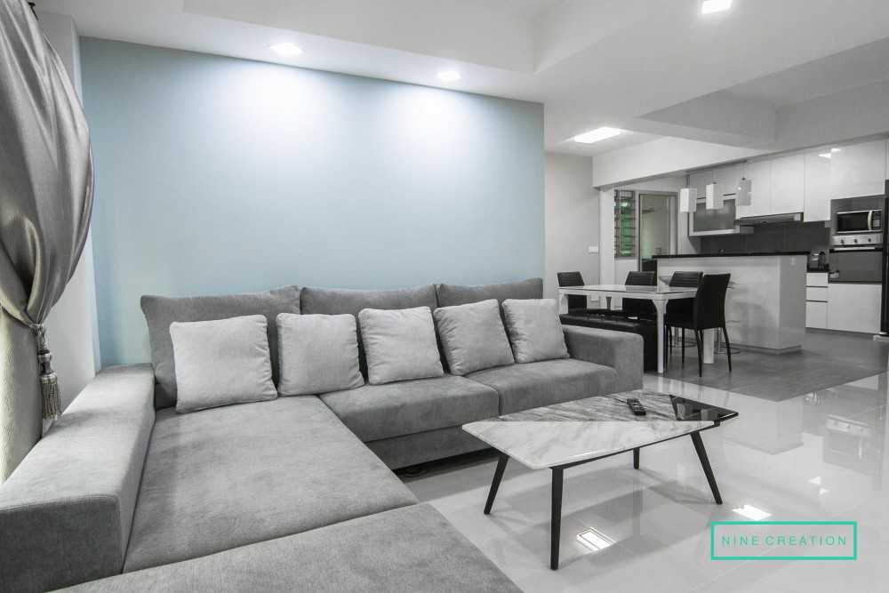Modern Living Room with Homogeneous Tiles and Downlights