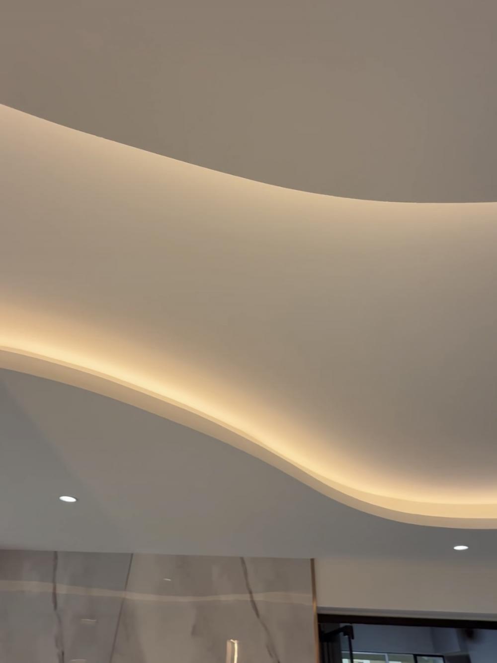 Contemporary Living Room with Cove Lighting and Drop Ceiling