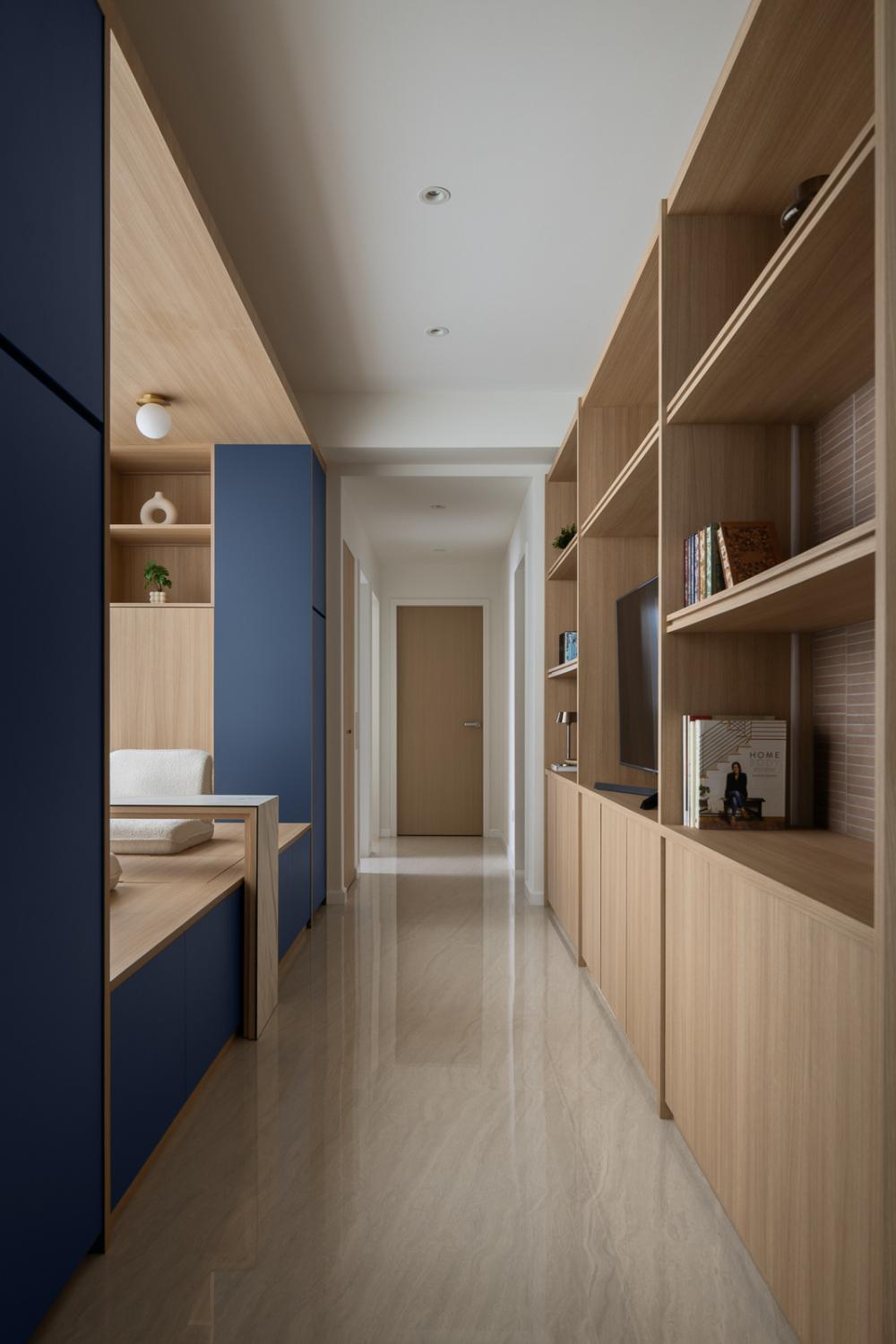 Contemporary Hallway with Bookshelf and Marble Floor