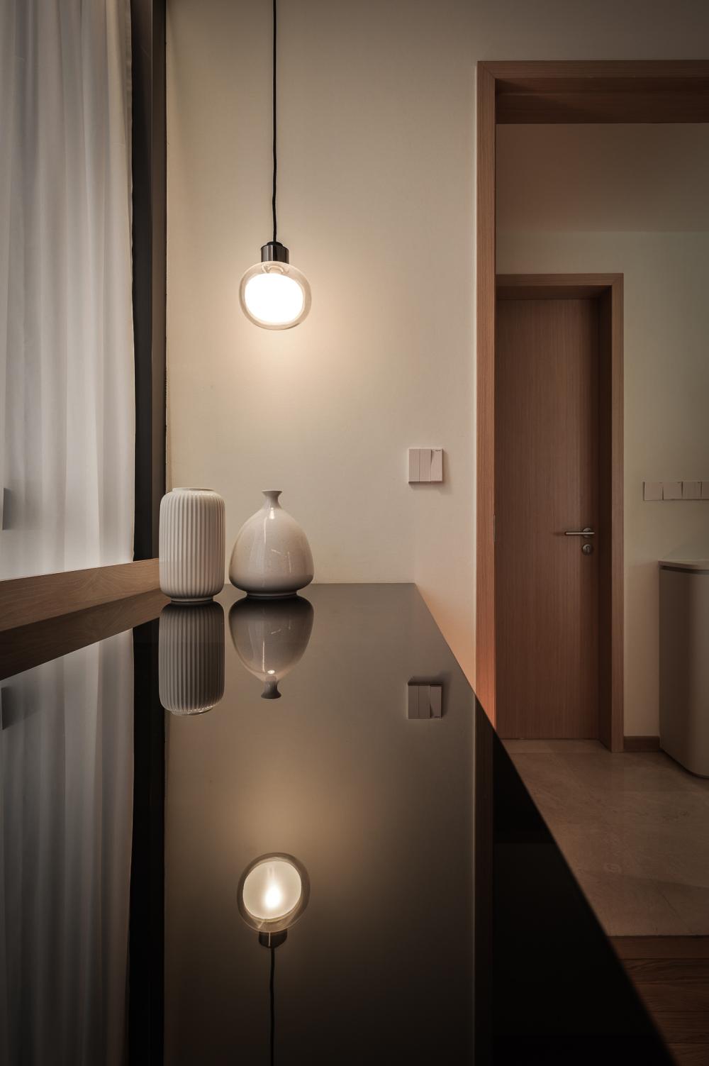 Modern Foyer with Artwork and Lighting