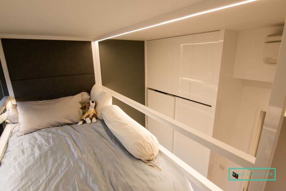 Contemporary Bedroom with Parquet Floor and Ceiling Light