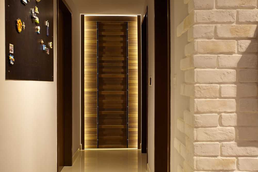 Eclectic Hallway with Downlights and Shelving Units