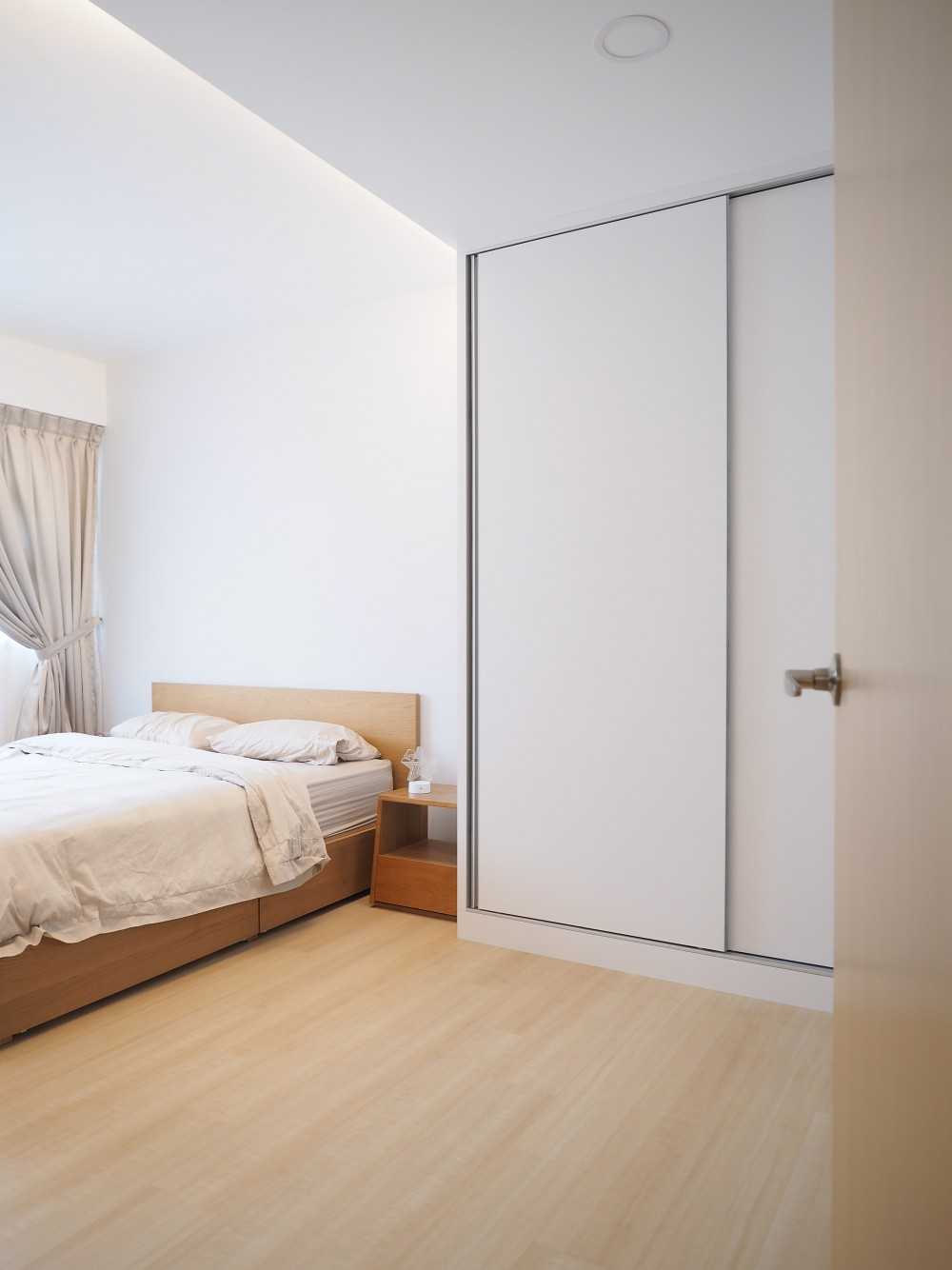 Scandinavian Bedroom with Cove Lighting and Drop Ceiling