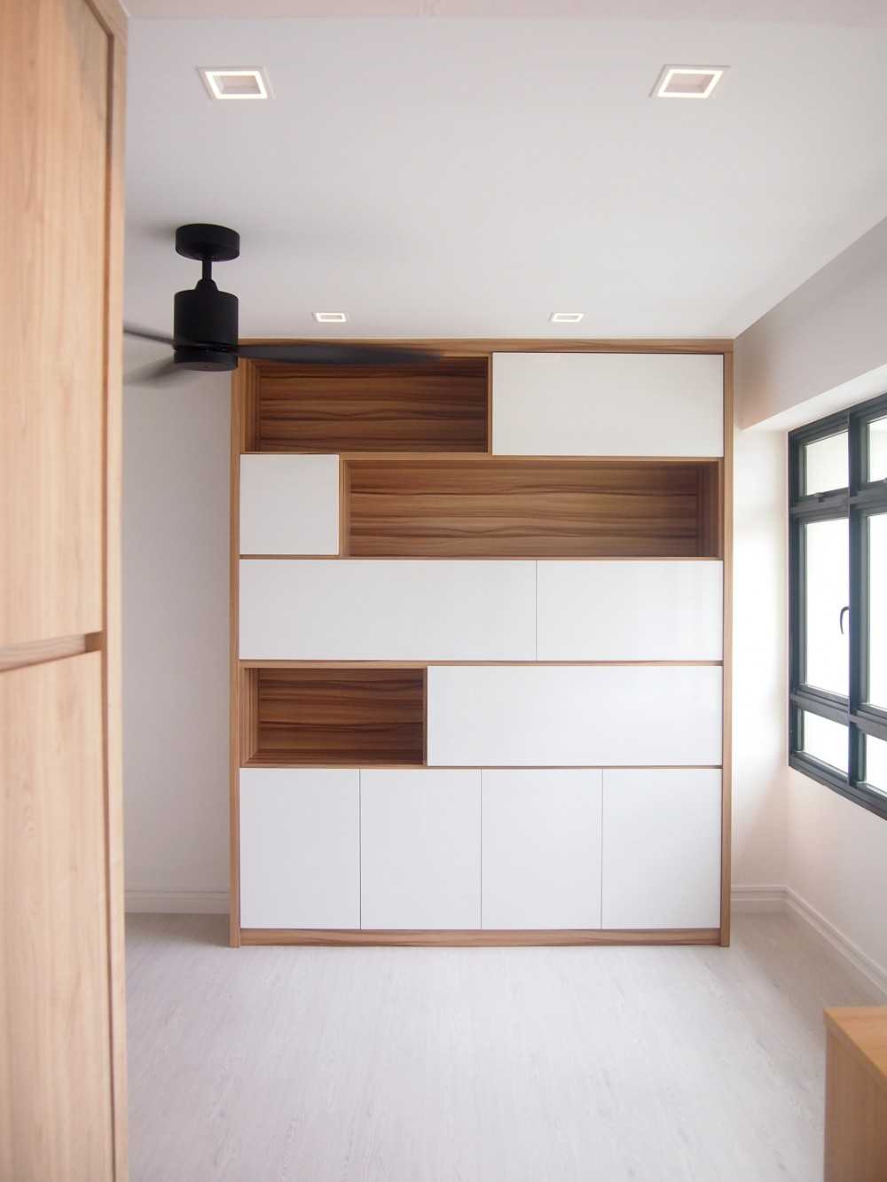 Scandinavian Hallway with Bookshelf and Artwork