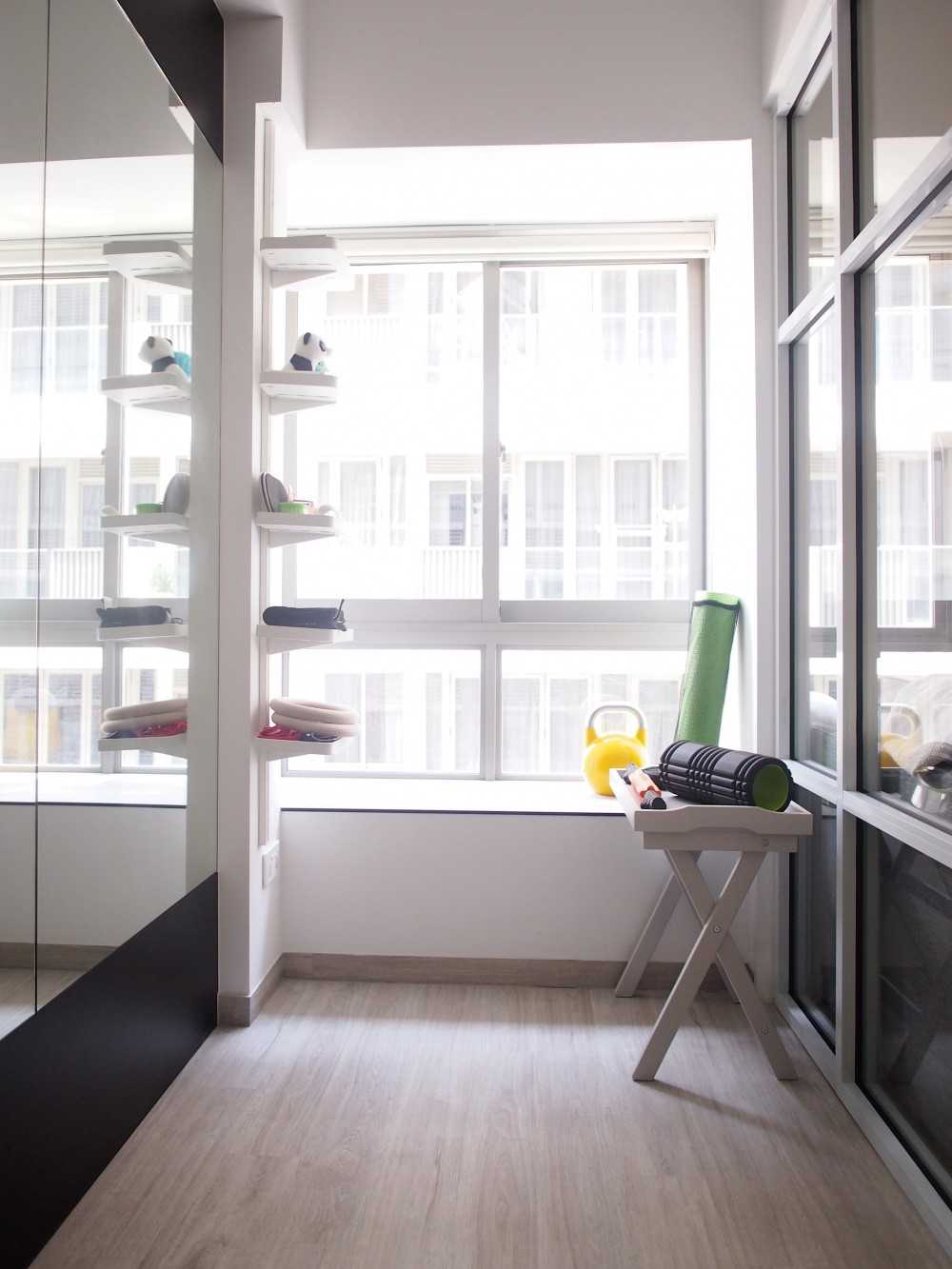 Scandinavian Home Gym with Seating Bench and Storage Cabinets
