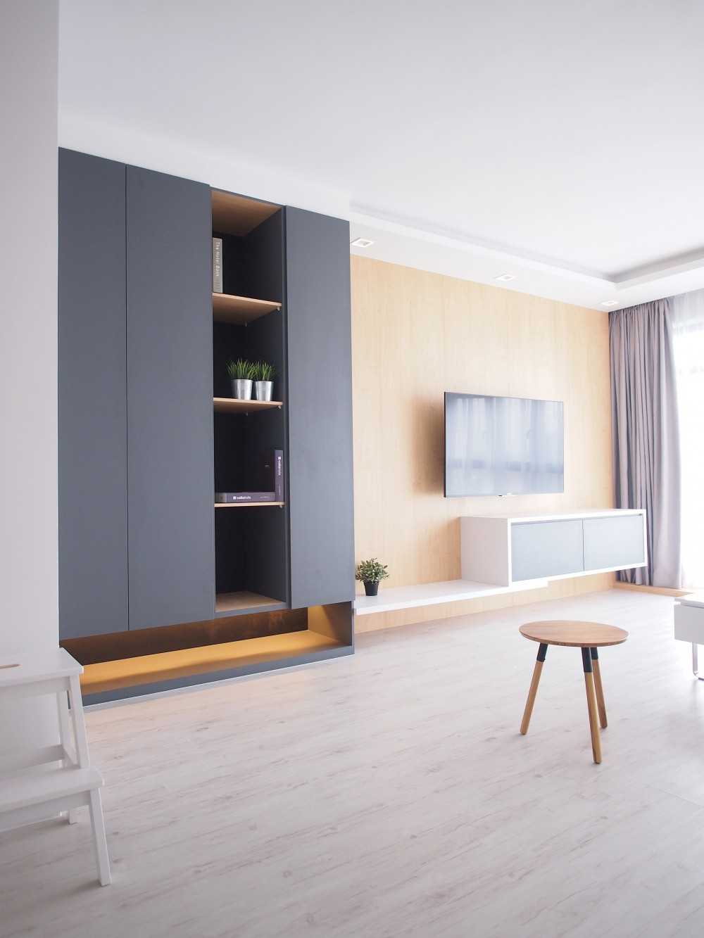 Modern Living Room with Bookshelf and Settee