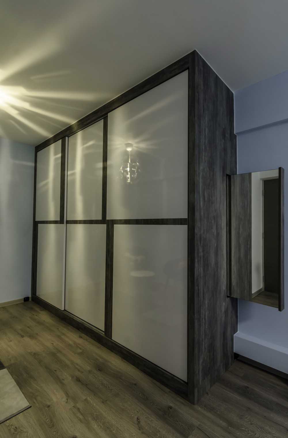 Industrial Bedroom with Vinyl Flooring and Wardrobe