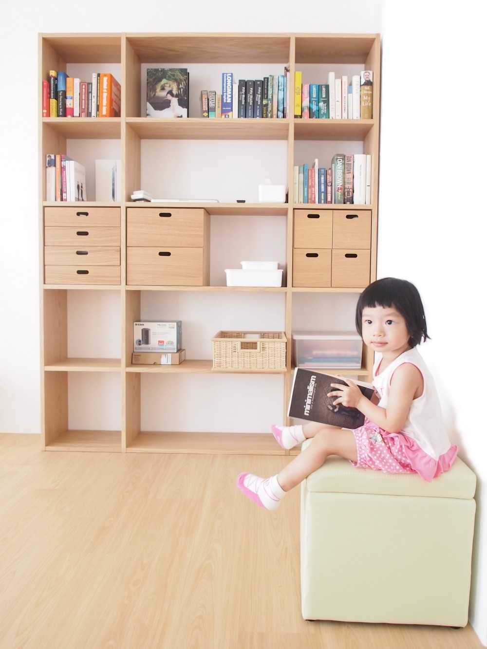 Scandinavian Hallway with Bookshelf and Artwork