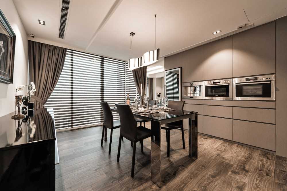 Modern Dining Room with Cove Lighting and Chandelier