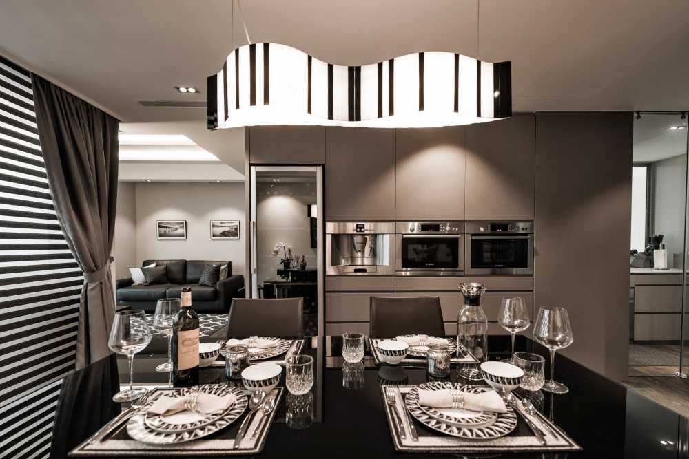 Modern Dining Room with Chandelier and Downlights