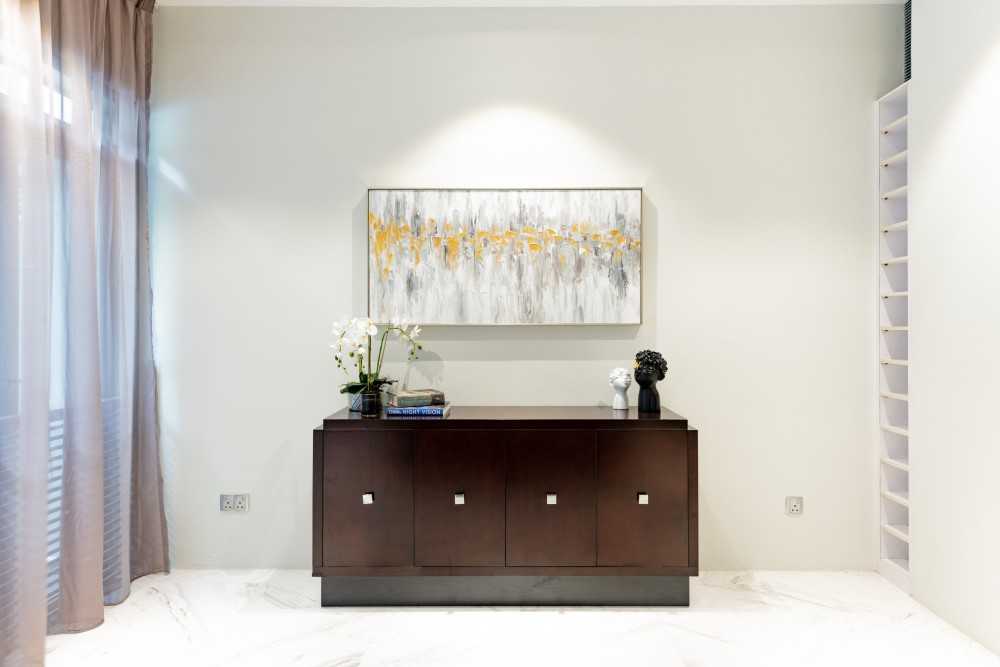 Contemporary Foyer with Artwork and Console Table