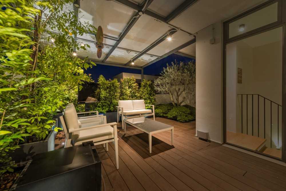 Modern Outdoor with Metal Gate and Landscaping