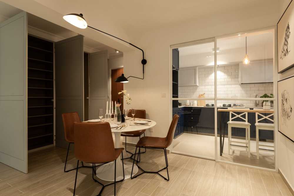 Scandinavian Dining Room with Cove Lighting and Dining Table