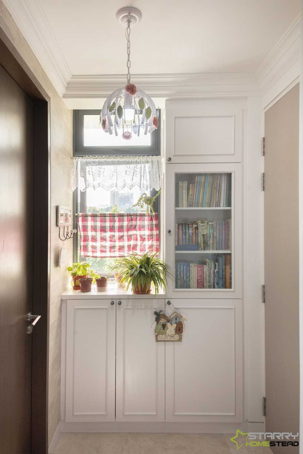 Country Entryway with Display Cabinets and Houseplants